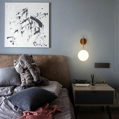Australum LUNA globe sconce in modern interior setting
