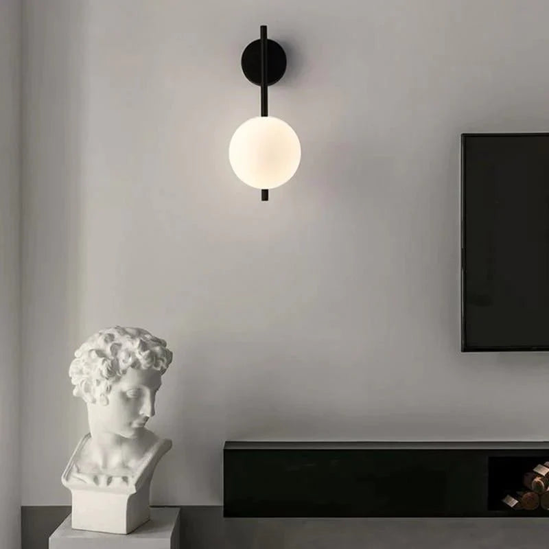 Australum LUNA black globe sconce with warm white 3000K light