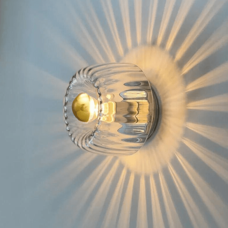 Australum Sol modern starburst sconce in brushed gold