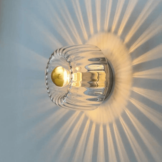 Australum Sol modern starburst sconce in brushed gold