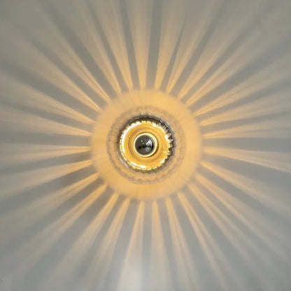 Australum Sol wall sconce installed in modern living room